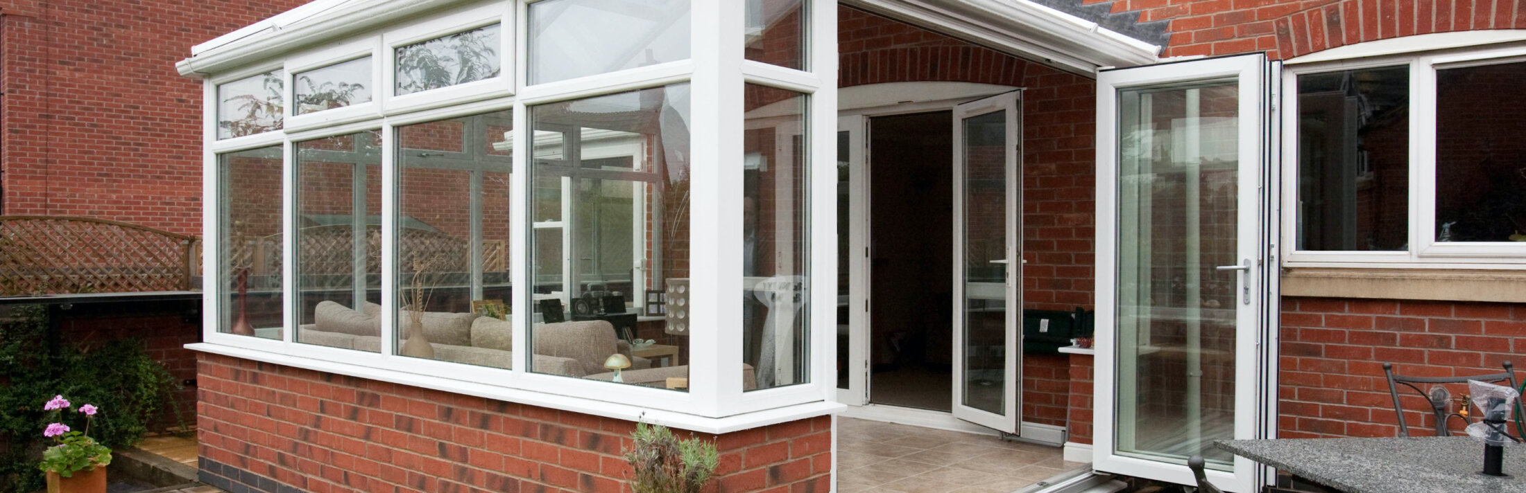 Evolve BiFold Victorian Conservatory Side On Doors Open copy@2x